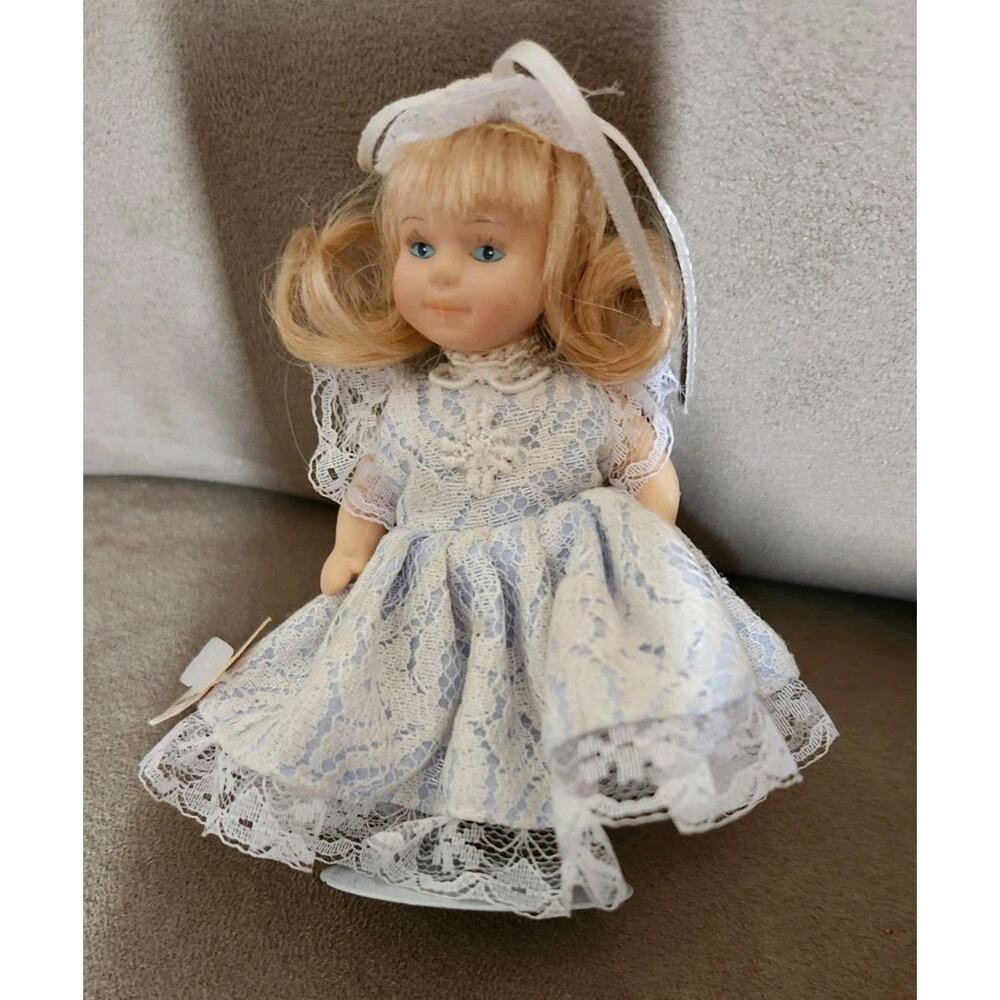 Vintage "AM Creations" Porcelain Doll With Stand